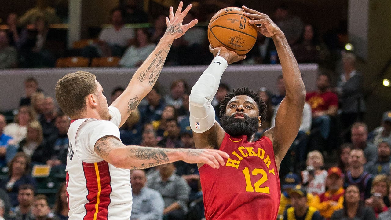Evans breaks out of slump in a major way as Pacers defeat Heat 99-91
